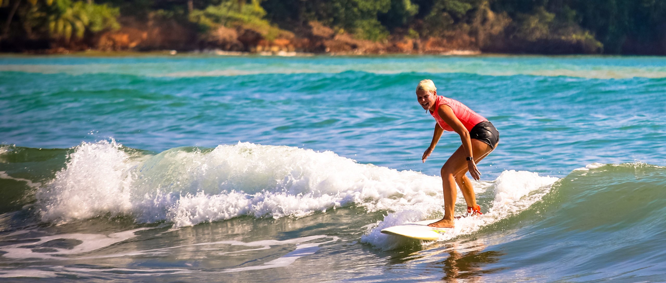 Surfer Riding a Wave: Altos de Miramar, Dominical, Osa Peninsula